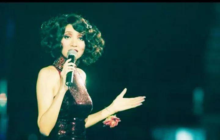 为什么梅艳芳被称为"香港姑娘",她代表着怎样的香港精神?_时代_舞台_