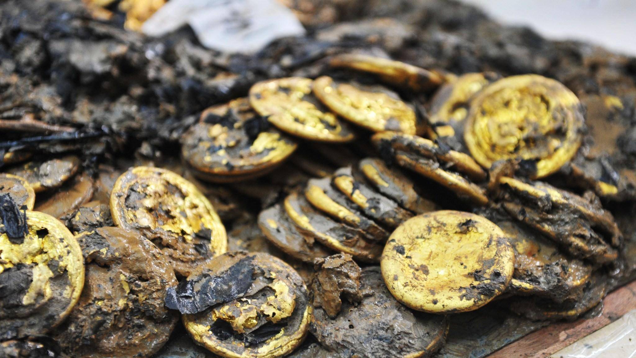 海昏侯刘贺墓出土的黄金文物:墓室内一片金黄,每枚金饼重达半斤