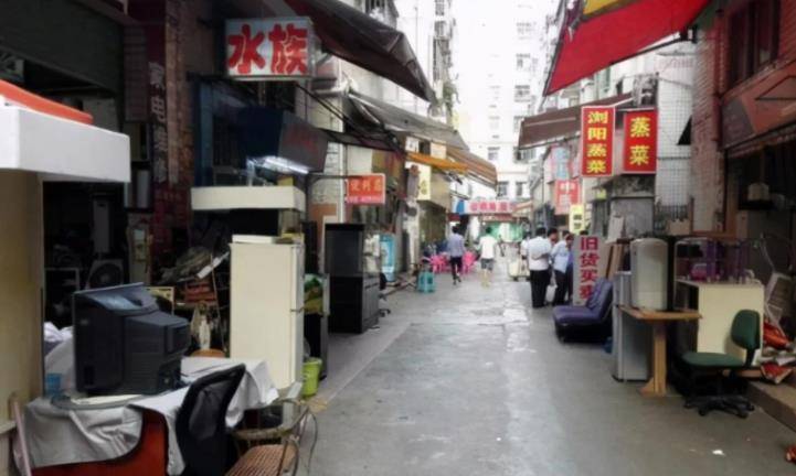 城中村,吸引无数打工人在此聚集,却被称为"城市伤疤"_塘村_房租_街道