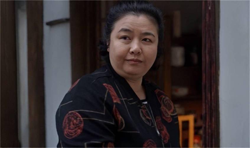 在《四世同堂》中她饰演"胖菊子"一角等等