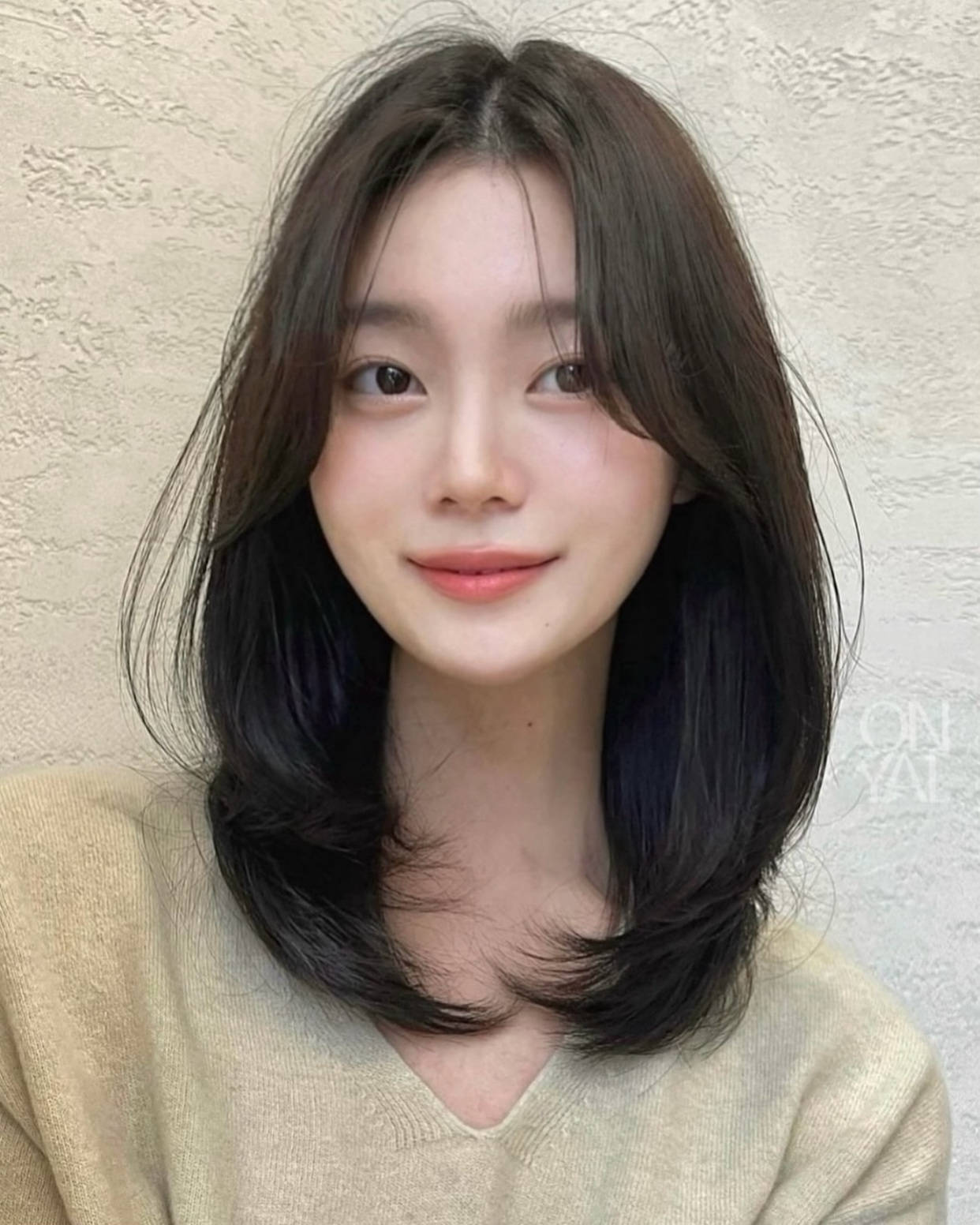 锁骨发内扣女性修颜的时尚之选
