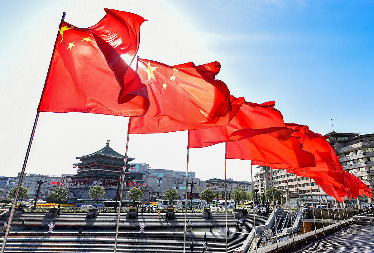 北京将升挂23万面国旗红旗满城中国红的盛况