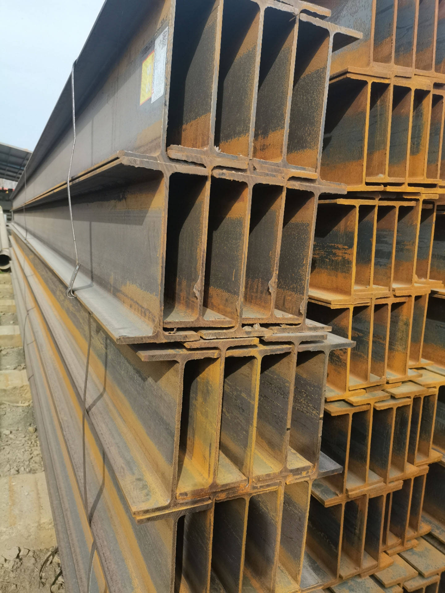 top新疆旭纳永固钢结构有限公司:彩钢夹芯板/钢结构加工厂/h型钢/彩钢