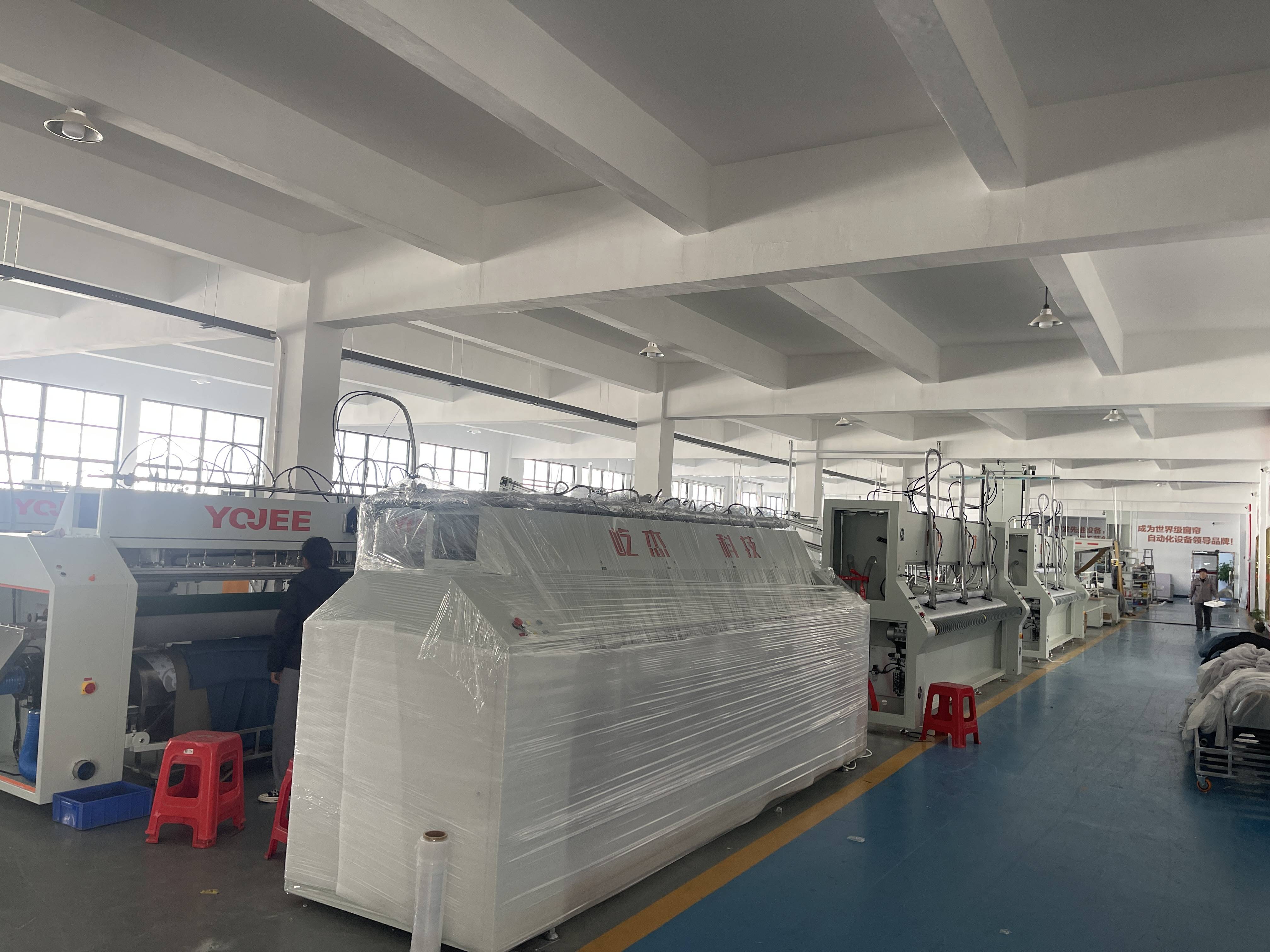 自动窗帘布带机生产厂家怎么选?屹杰科技用终身服务筑牢合作根基