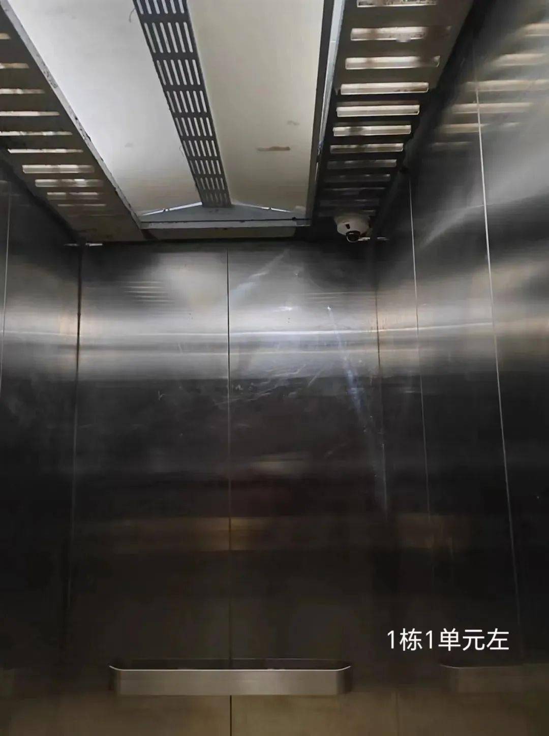 长江新区这个小区启用"神器"_宣传_电梯_自行车