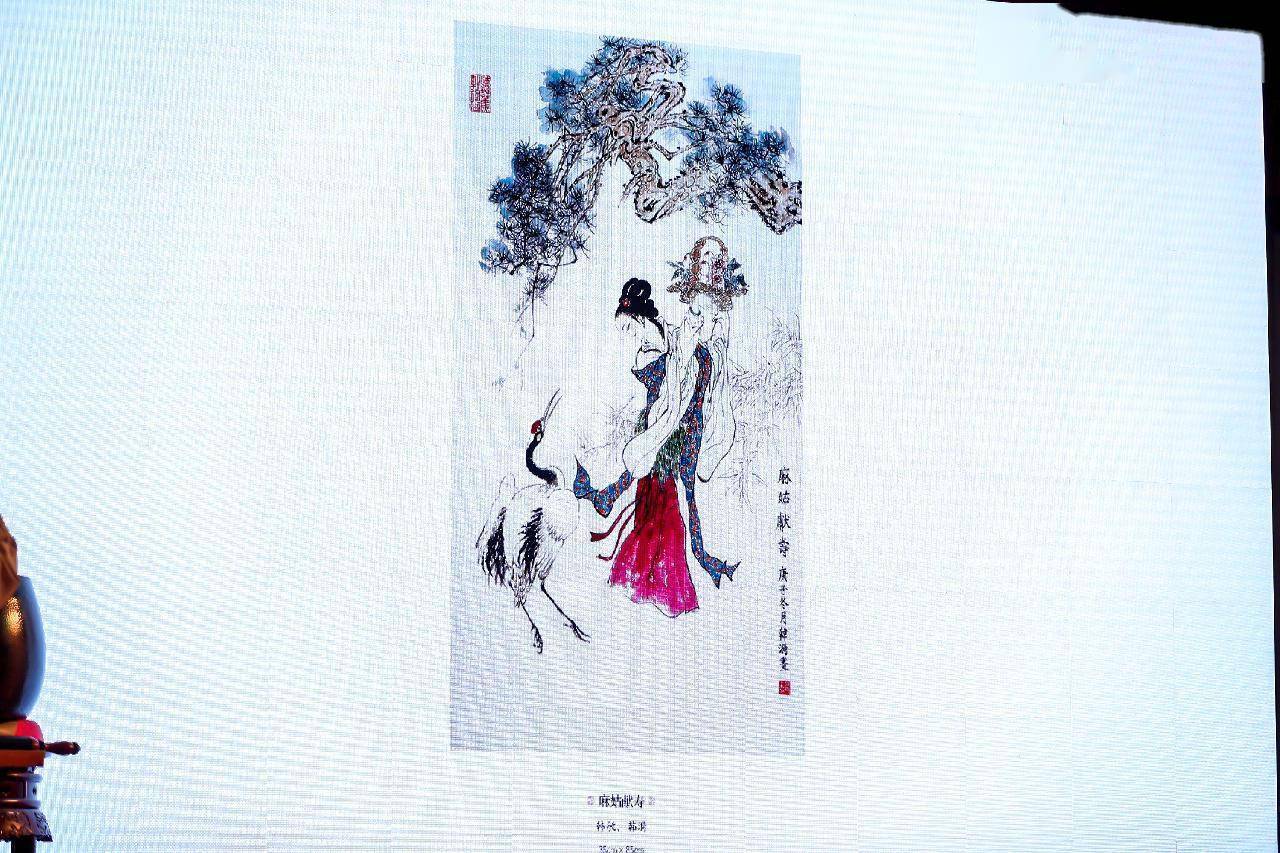 上海大慈公益基金会理事长照诚法师与著名书画家韩敏的孙女韩漪合创了