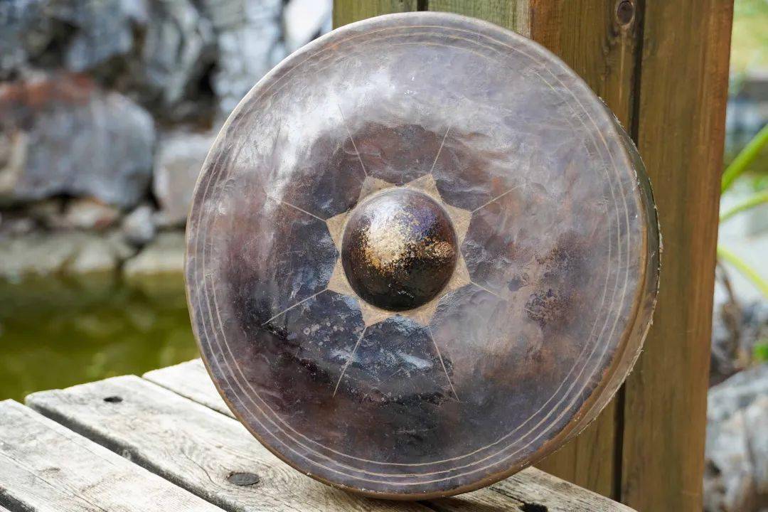 哈尼族铓鼓:寓意谷物丰收的伴奏乐器