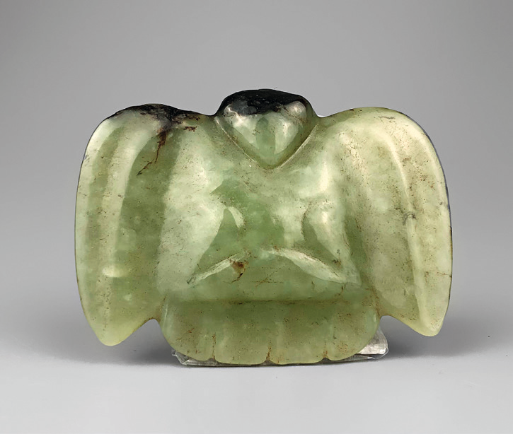 以具有通灵功能的玉石塑造猫头鹰形象并非东北红山文化的"独创",在