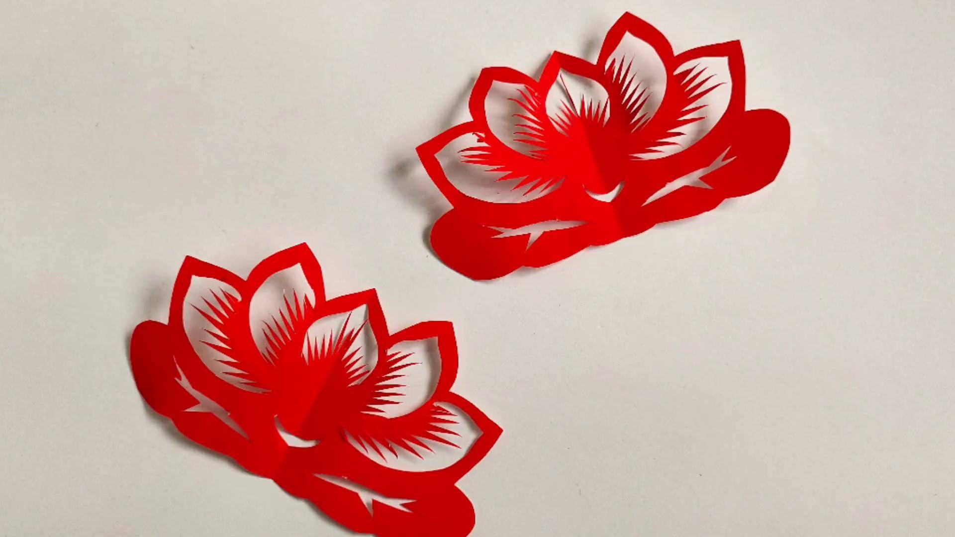 一朵莲花,对折剪莲花剪纸dou是优等生萌知计划