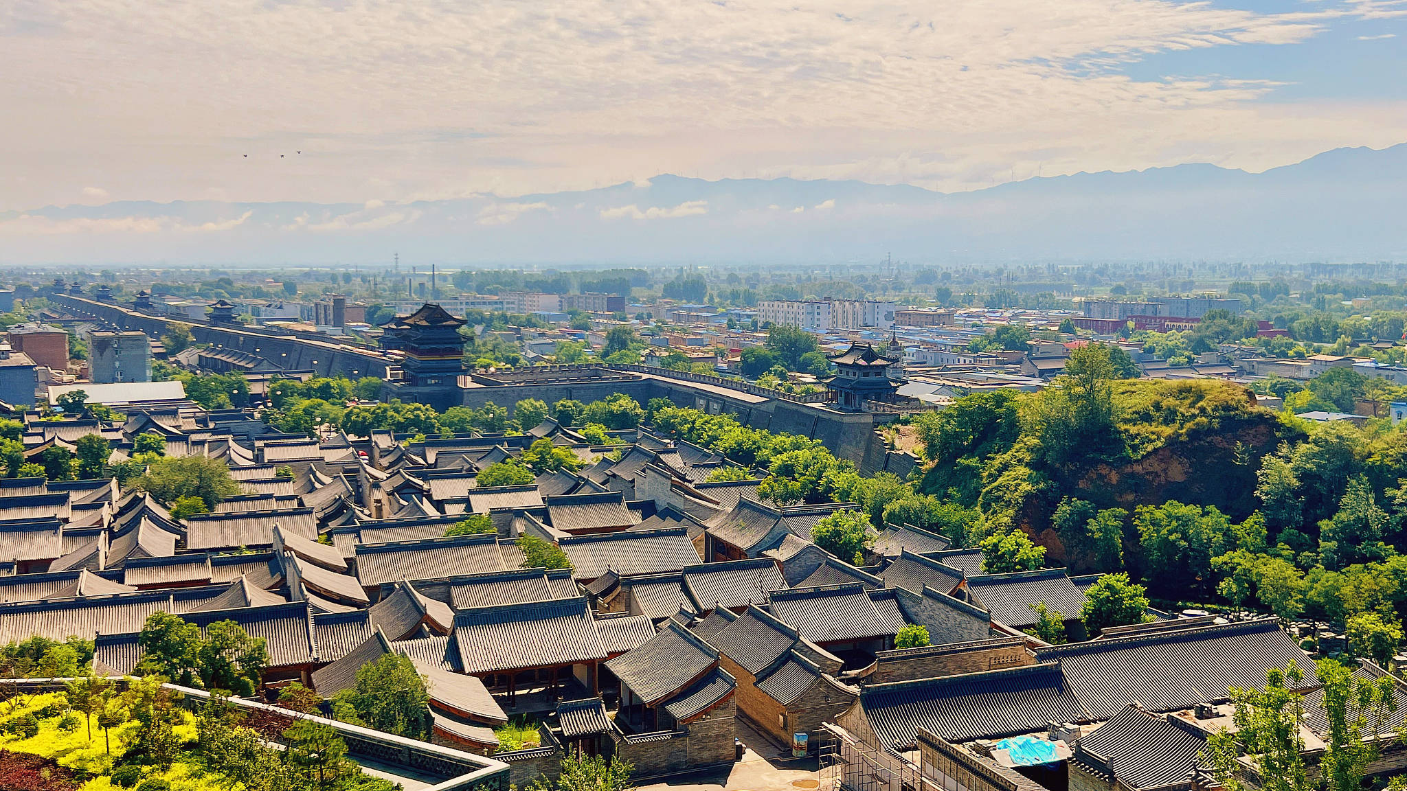 山西忻州古城 视觉中国 图坐落在煤炭主产区的山西忻州近年来也在积极