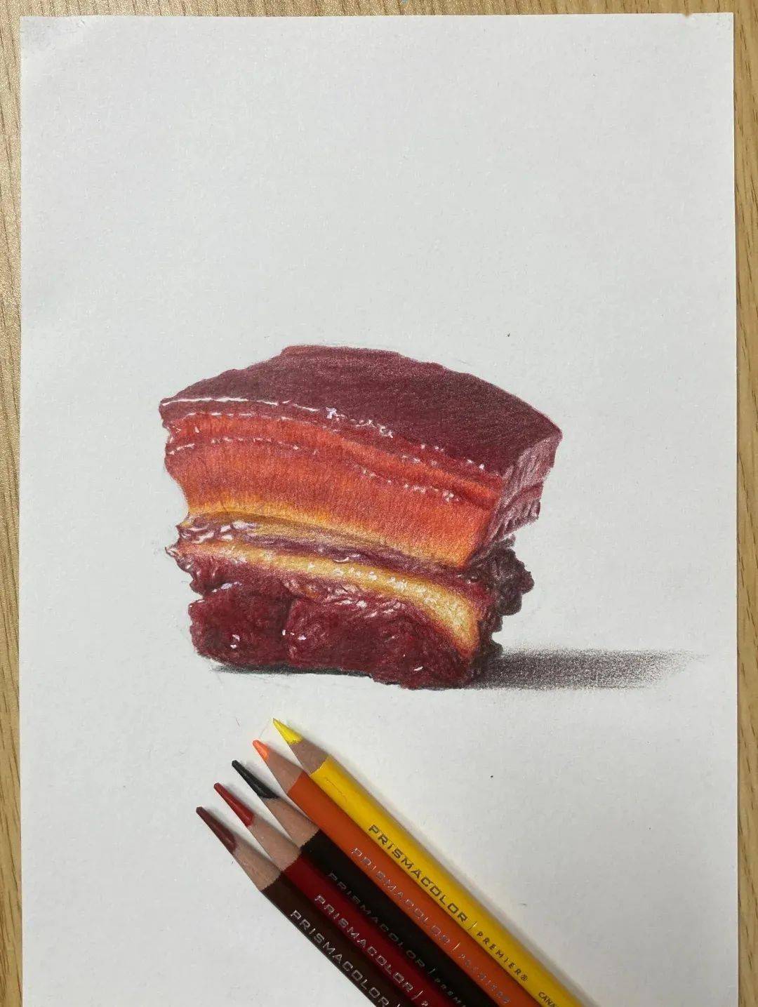 如何用彩铅画一块红烧肉