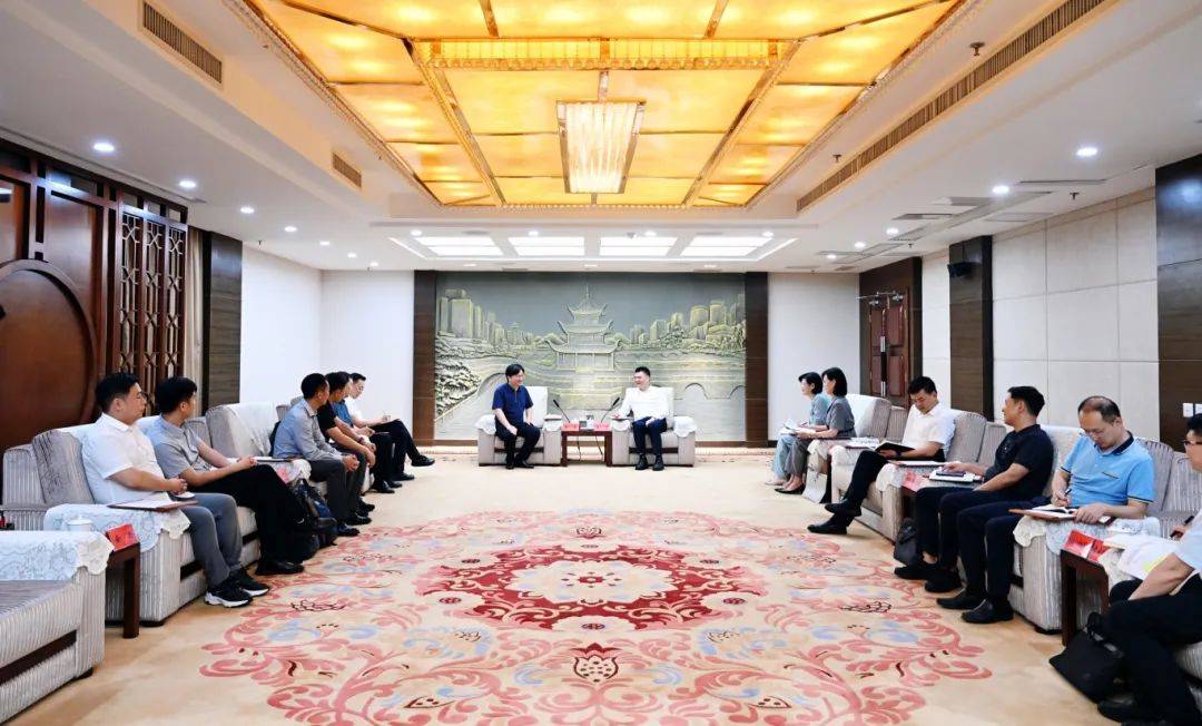 王宏会见信立集团、金茂智慧交通科技有限公司董事长王立一行