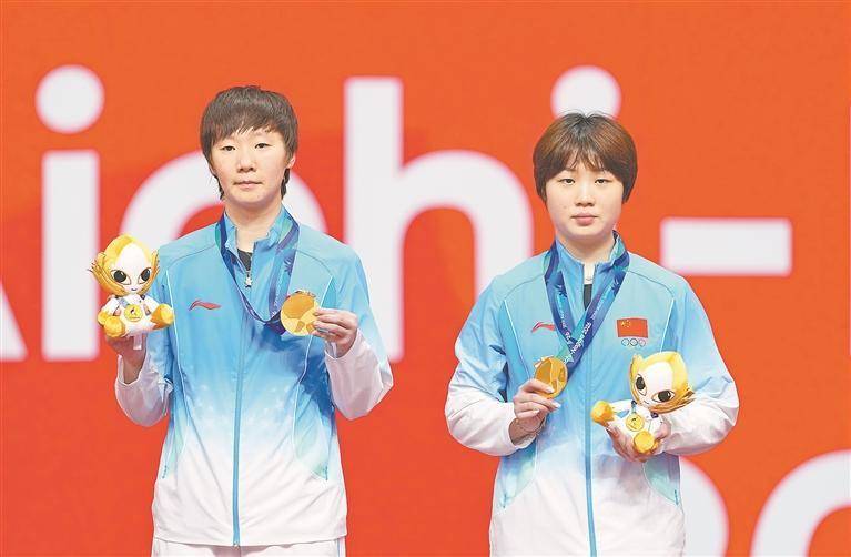 中国队获亚运会乒乓球女双男单冠军